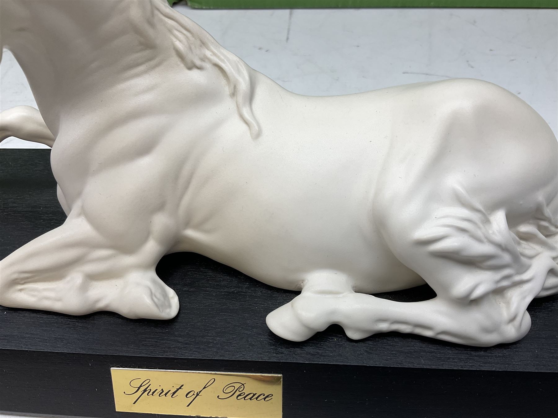 Five Beswick and Royal Doulton horse figures in matt white on black plinths, comprising of  Spirit of Affection no. 2689/2536, Springtime no.2837, Spirit of peace no.2916, Spirit of earth no.2914 and Spirit of the wild no. 183, together with a composite figure of a horse (6)