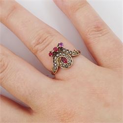 Victorian 9ct rose gold red paste and seed pearl ring, oval paste stone within a scrolling border of seed pearls, surmounted with round cut red paste stones