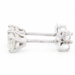 Pair of 18ct white gold diamond earrings, each stud four claw set with a single round brilliant cut diamond, stamped 750, total diamond weight approx 1.05 carat
