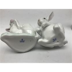 Four Lladro rabbit figures, comprising, Hippity Hop no 5886, Sitting Bunny no 5907, Washing up no 5887, and Rabbit Eating no 4773, largest example 14cm  