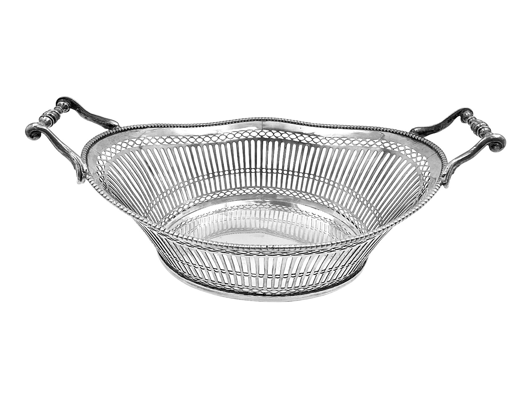 Early 20th century Dutch silver basket, of oval form with pierced sides, beaded rim, and twin handles, marked with Lion Passant for 2nd standard purity and date letter for 1910, other marks worn and indistinct, including handles H8.5cm L25.5cm