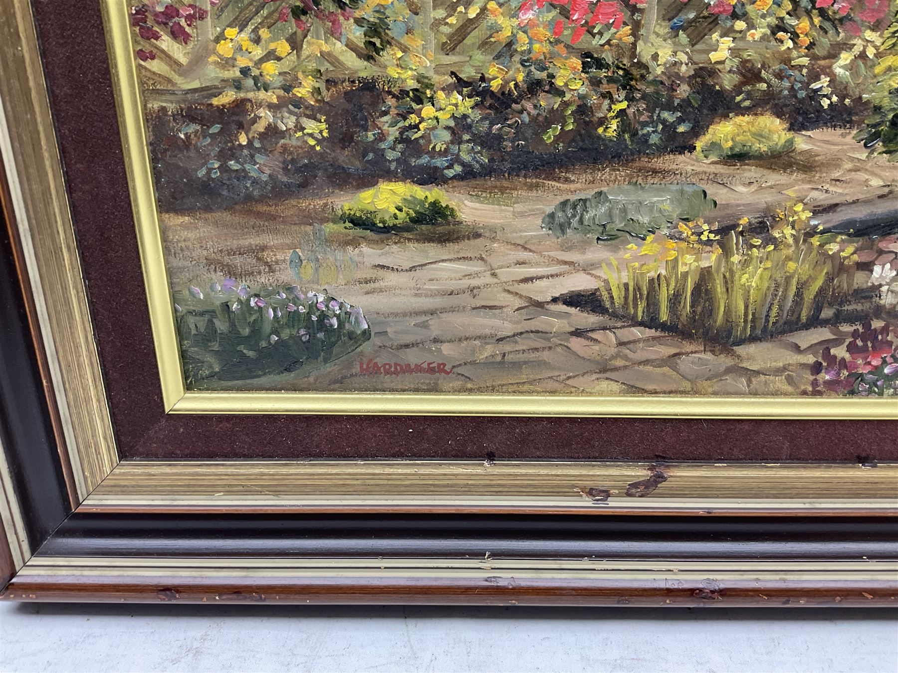 James Hardaker (British 1901-1991): 'Part of the Garden Meadowcroft - Bingley Yorkshire', oil on board signed, titled verso 38cm x 60cm