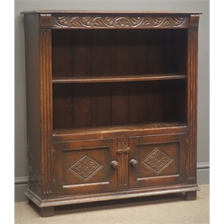  Oak open bookcase carved frieze fitted with two panel cupboard doors, block feet, W84cm, H94cm, D28cm  