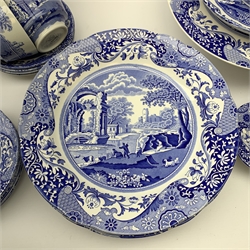A collection of Spode Italian blue and white ceramics comprising nine dinner plates, four side plates, six tea plates, five cups & saucers, jug, cake stand, sandwich plate, circular bowl, mug and three bonbon dishes.