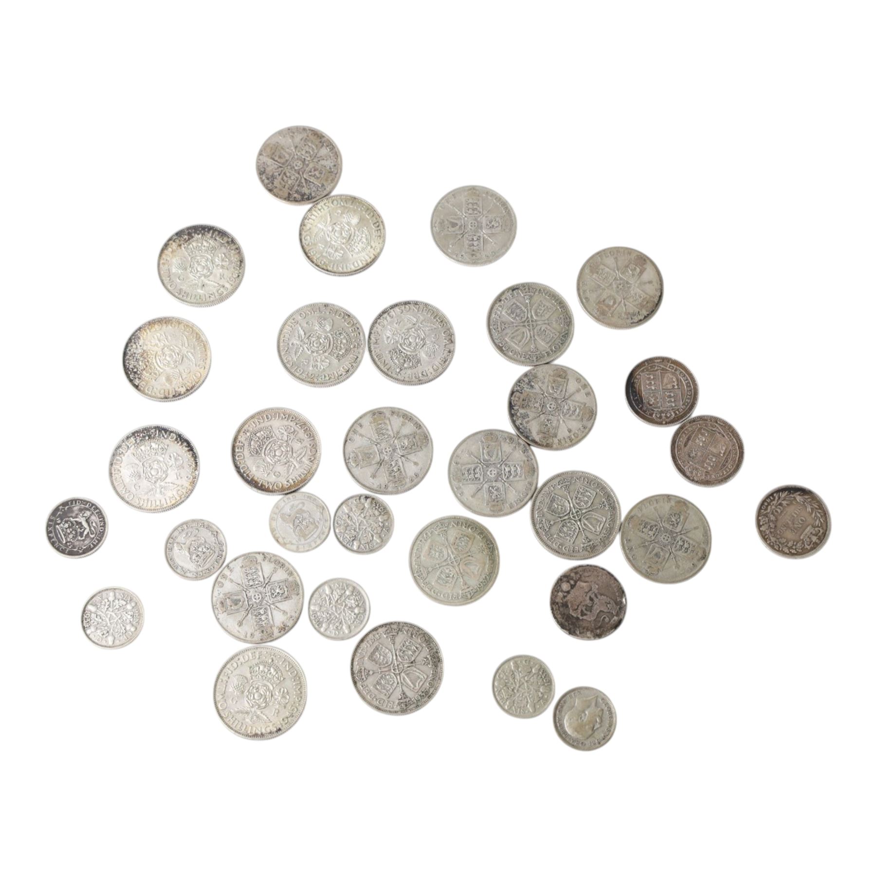 Twenty Great British pre-1947 silver one florin or two shilling coins, eight pre-1947 silver sixpence coins, George IV silver one shilling coin, and three Queen Victoria silver one shilling coins