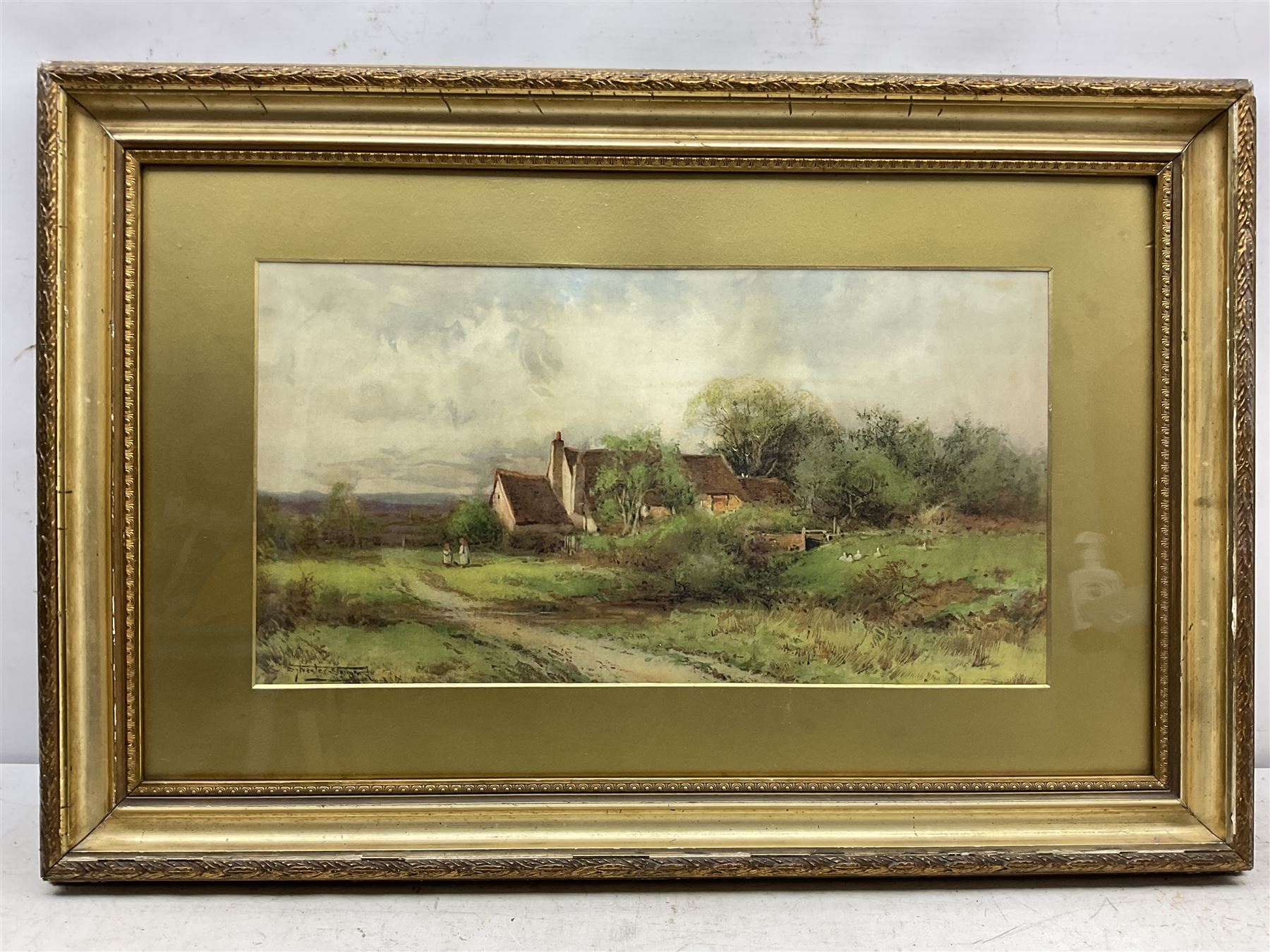 Henry John Sylvester Stannard (British 1870-1951): Ducks by a Rural Cottage, watercolour signed 29cm x 55cm