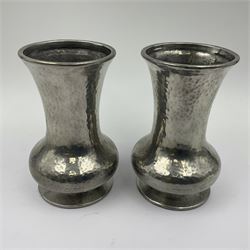Pair of Liberty & Co Tudric pewter vases, each of bellied form with hammered finish, upon a circular spreading foot, impressed beneath 0987, H12cm