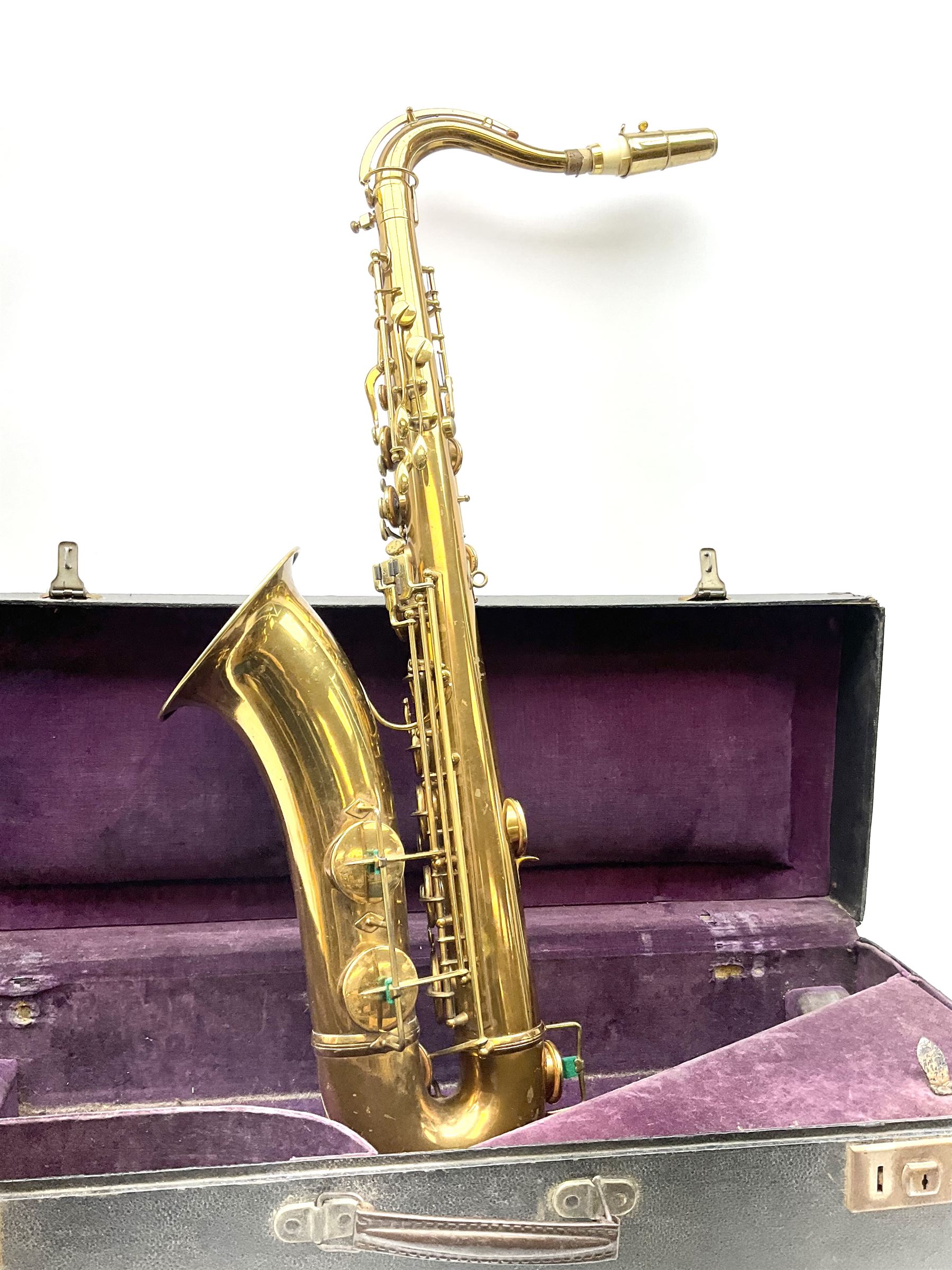 Brass tenor saxophone by Adolphe SAX, 84 Rue Myrha, Paris,  No.938 serial number 12097, H75cm excluding crook; in hard carrying case bearing plaque for Henri Selmer
