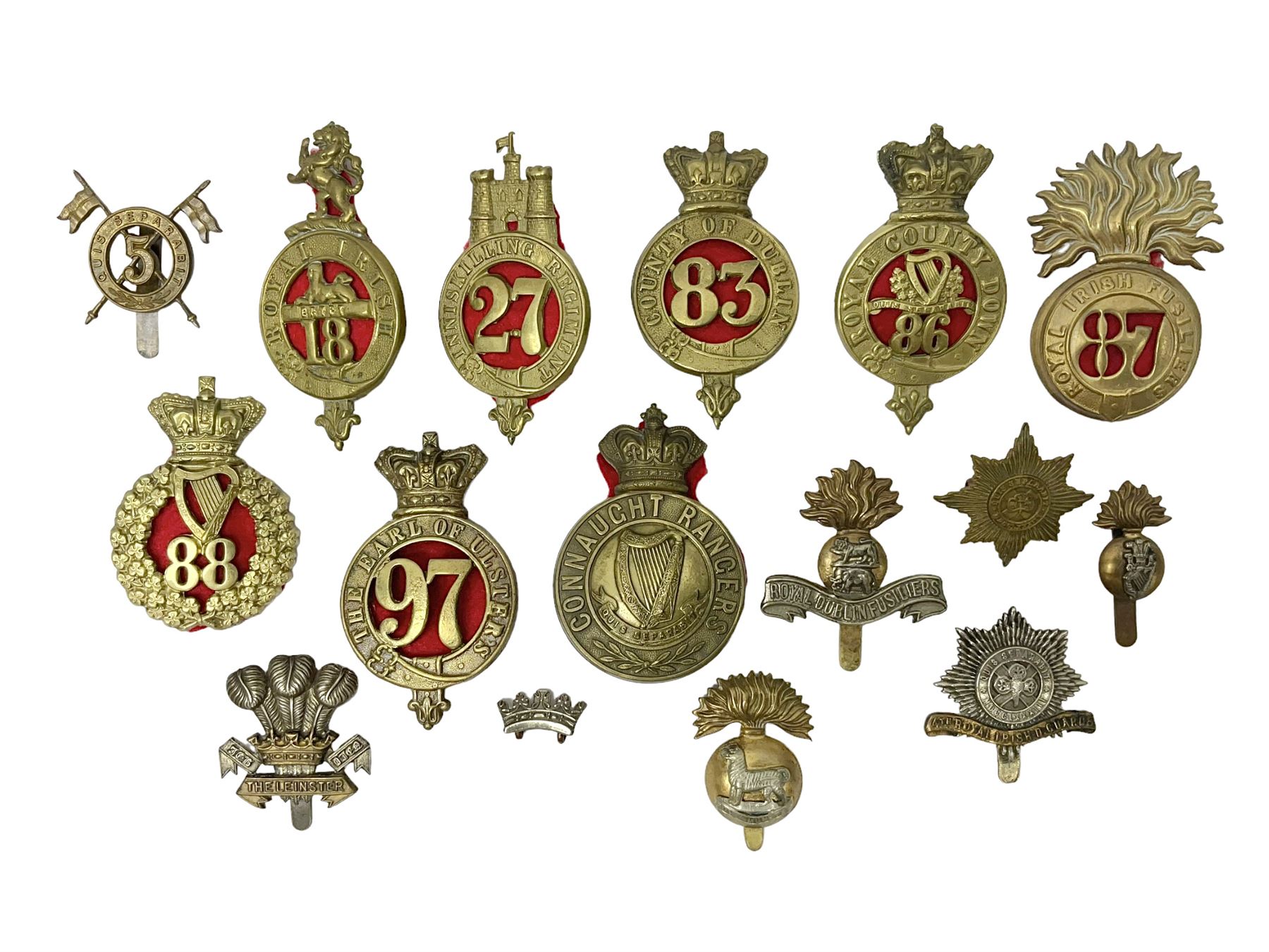 Fifteen cap badges of Irish interest including 4th Royal Irish Dragoon Guards, Connaught Rangers, Royal Irish, Munster and Dublin Fusiliers, 5th Lancers, Inniskilling Regt.,Leinster Regt., Irish Guards etc (15)