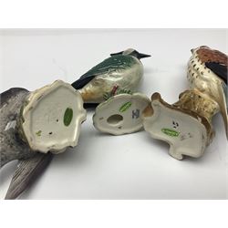 Collection twenty one of Beswick bird figures, to include Lapwing no 2416, Kingfisher no 2671, Red Pigeon 1383, Cuckoo no 2315, Nuthatch no 2418 etc