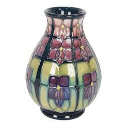 Two Moorcroft vases, in violets pattern, with original boxes, bud vase H17cm