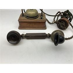Stick brass telephone, with a ring dial in a circular base with G.E.C marked to the front, together with cable telephone with external bell