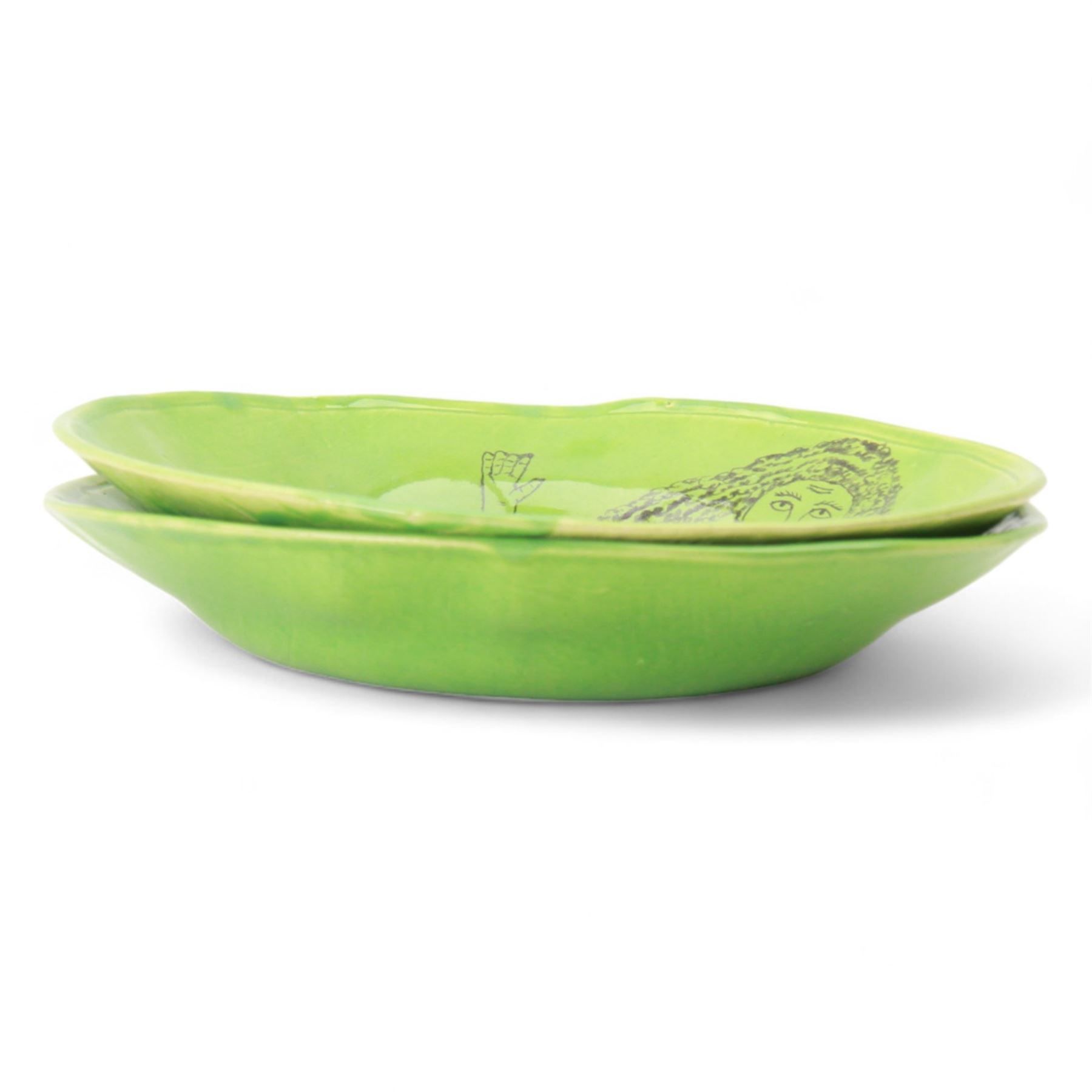 Hylton Nel (1941-); Two bowls, 1995, the green ground decorated internally with a mermaid, with makers mark and date to the base HN. 23.5.95