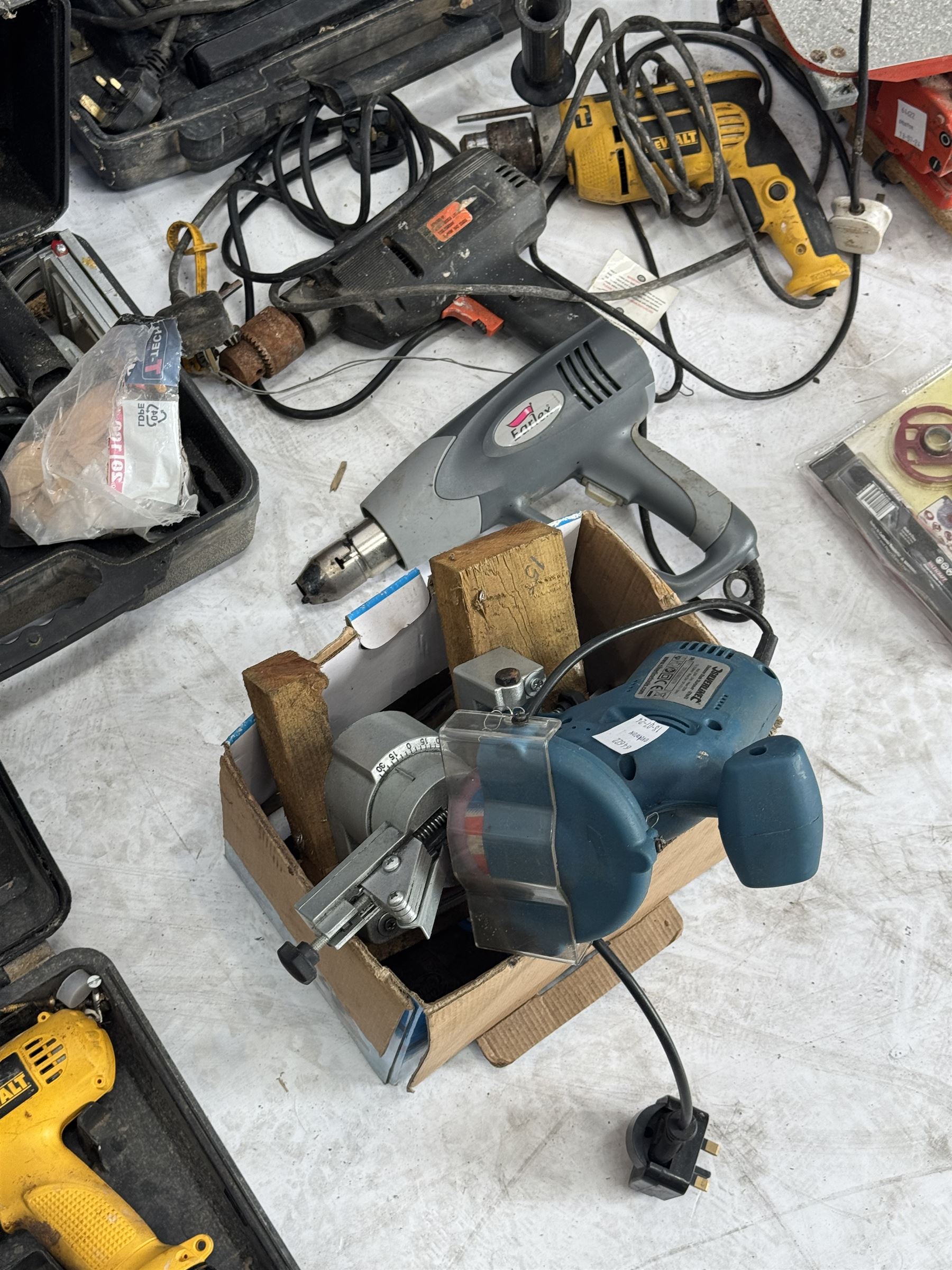 Performance Pro router with accessories, cased; DeWalt drill, two angle grinders with bits, biscuit jointer, bench grinder, scroll saw, heat gun, drills and other