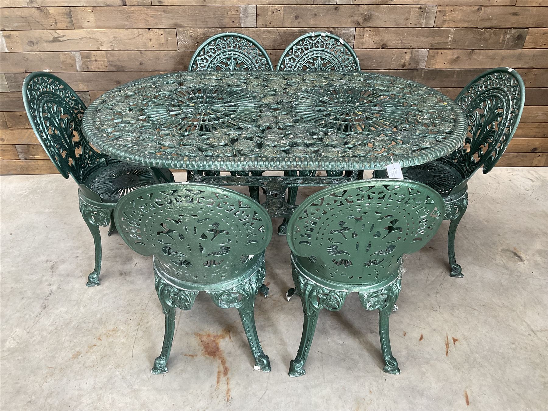 Victorian design cast aluminium oval garden table, and six chairs