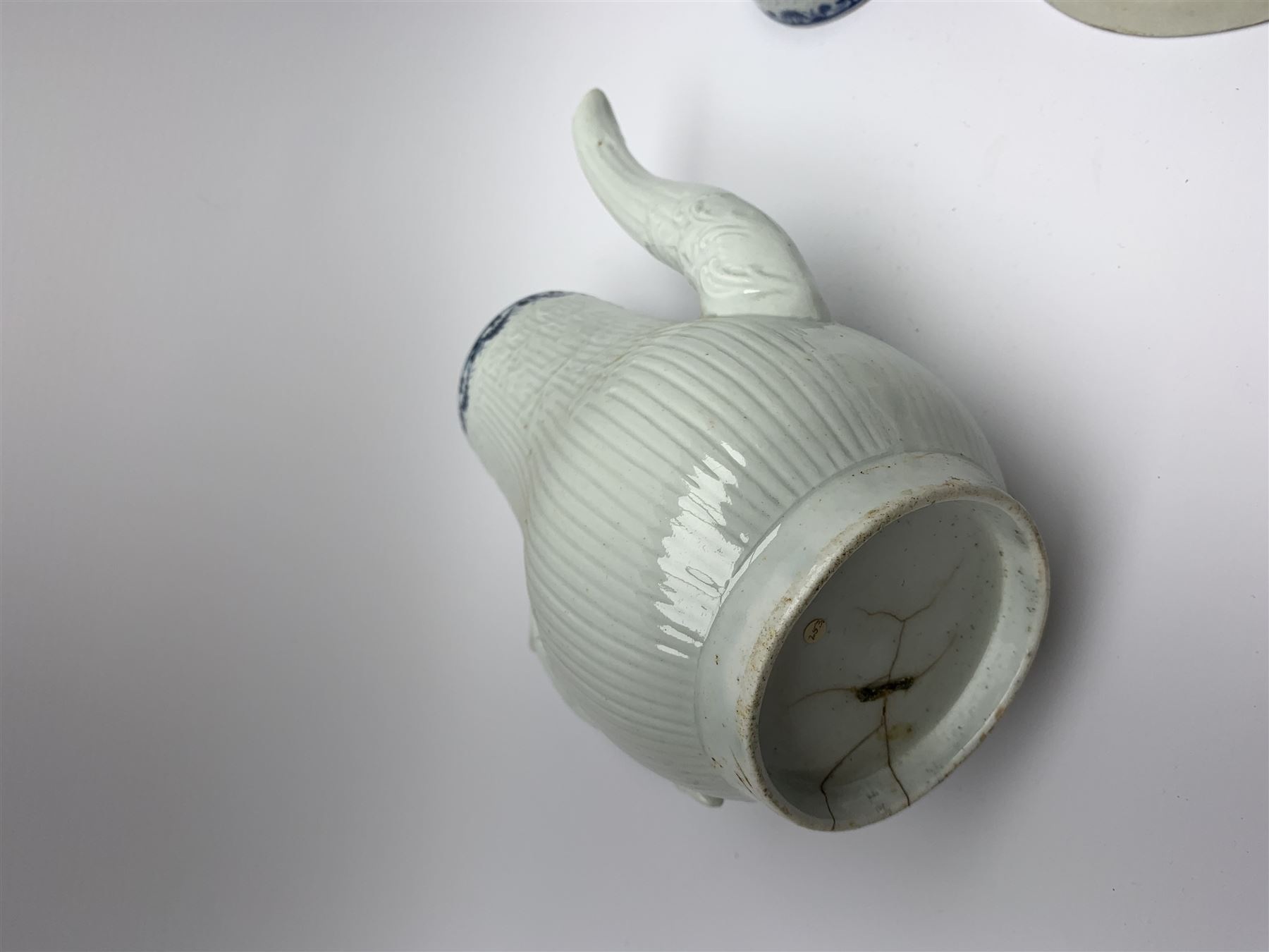 18th century Phillip Christian Liverpool reeded and floral moulded tea wares, comprising coffee pot, tea bowl and saucer, and coffee cup and saucer, each detailed with foliate and trellis borders, teapot H25cm, tea bowl D7.5cm, saucer D13cm 