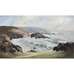 Mary Wastie (Cornish 1935-): Rocky Seascape near Pendeen, oil on canvas signed 39cm x 65cm 