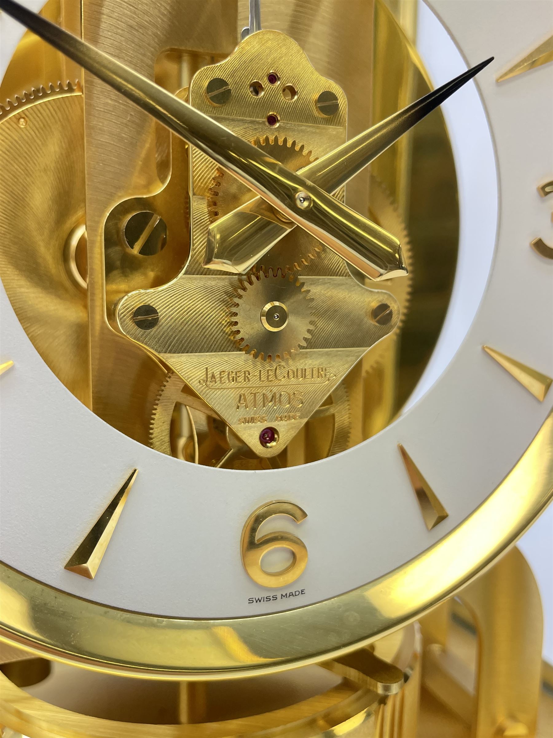 Jaeger-LeCoultre Atmos timepiece clock, in gilt brass and glass case, with wall mount, serial number - 444966