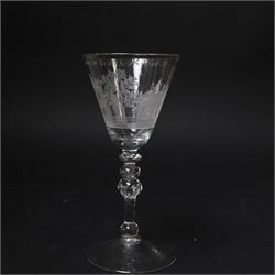 Dutch engraved Newcastle light baluster glass, circa 1760, the funnel bowl engraved with a two storey country house and church flanked by trees, beneath the inscription ‘T WELVAREN VAN LANDT ENKERK’ (The prosperity of the Country and Church), upon a multi knopped stem with beaded knop and basal knop, over conical foot, H18cm



