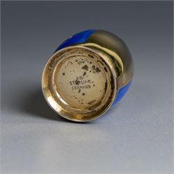 Mid 20th century Danish silver-gilt and guilloche enamel cruet set by Volmer Bahner, comprising pepper shaker, open salt and salt spoon, the spoon handle and bowl interior with blue basse taille enamel and vine motif, the pepperette with panels of blue guilloche enamel with similar applied vine decoration, all stamped Sterling Denmark VB, pepperette H4cm