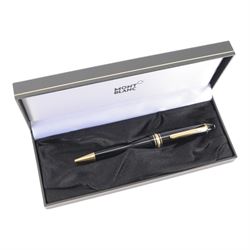 Montblac Meisterstuck ballpoint, together with a Montblanc leather pen case, both with original boxes 