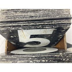 Collection of approximately fifty five cricket score cards, each black metal card painted in white with a singular number, H15cm W15cm