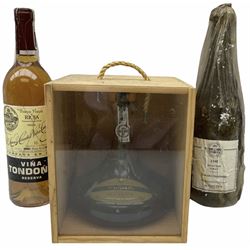 Three bottles of alcohol, various contents and proofs