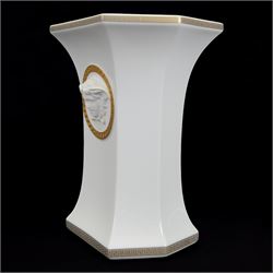 Rosenthal Versace Gorgona vase, of rectagular form with fluted base and rim, decorated in relief with medusa masks and gilt greek key borders upon a white ground, boxed, H23cm