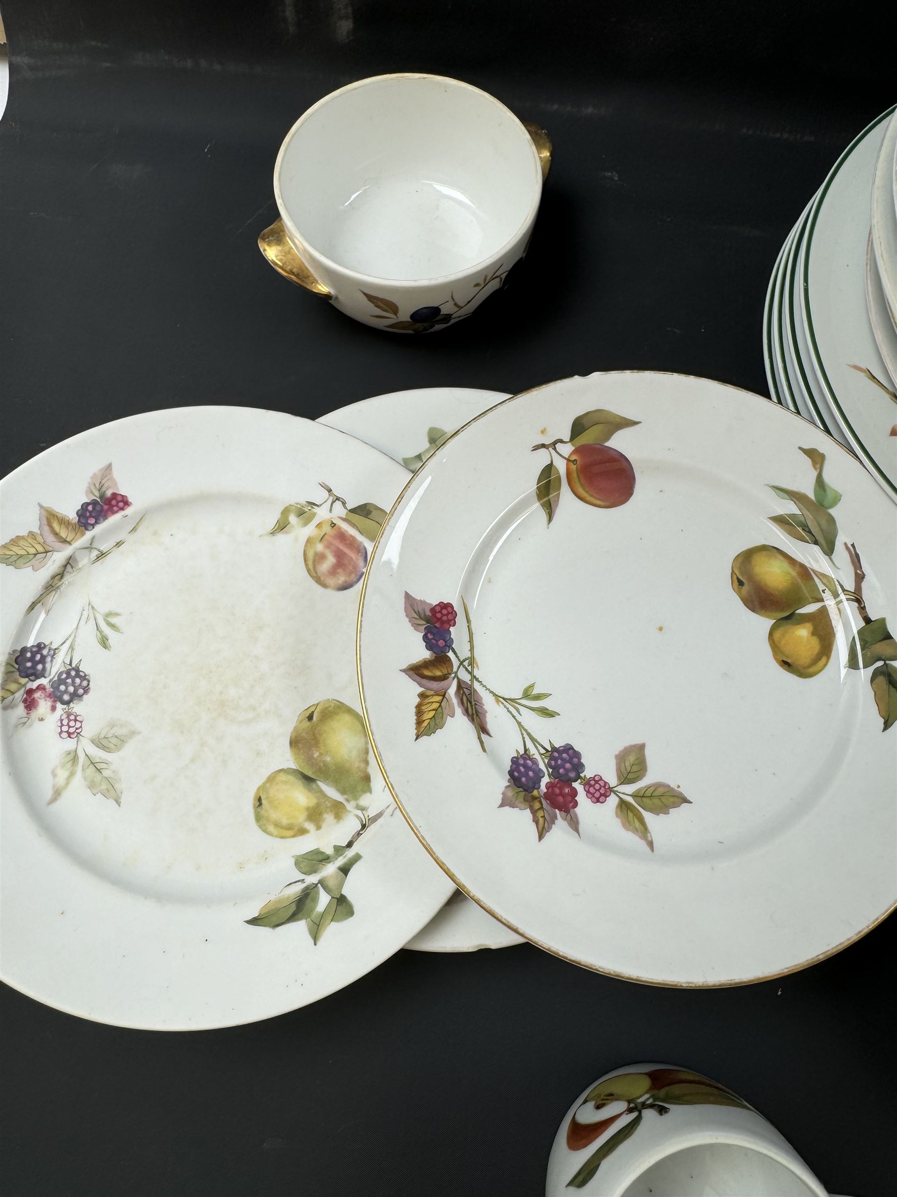 Royal Worcester Evesham pattern part dinner service, including covered jars, covered serving dishes, sauce jugs, dinner plates, side plates etc  
