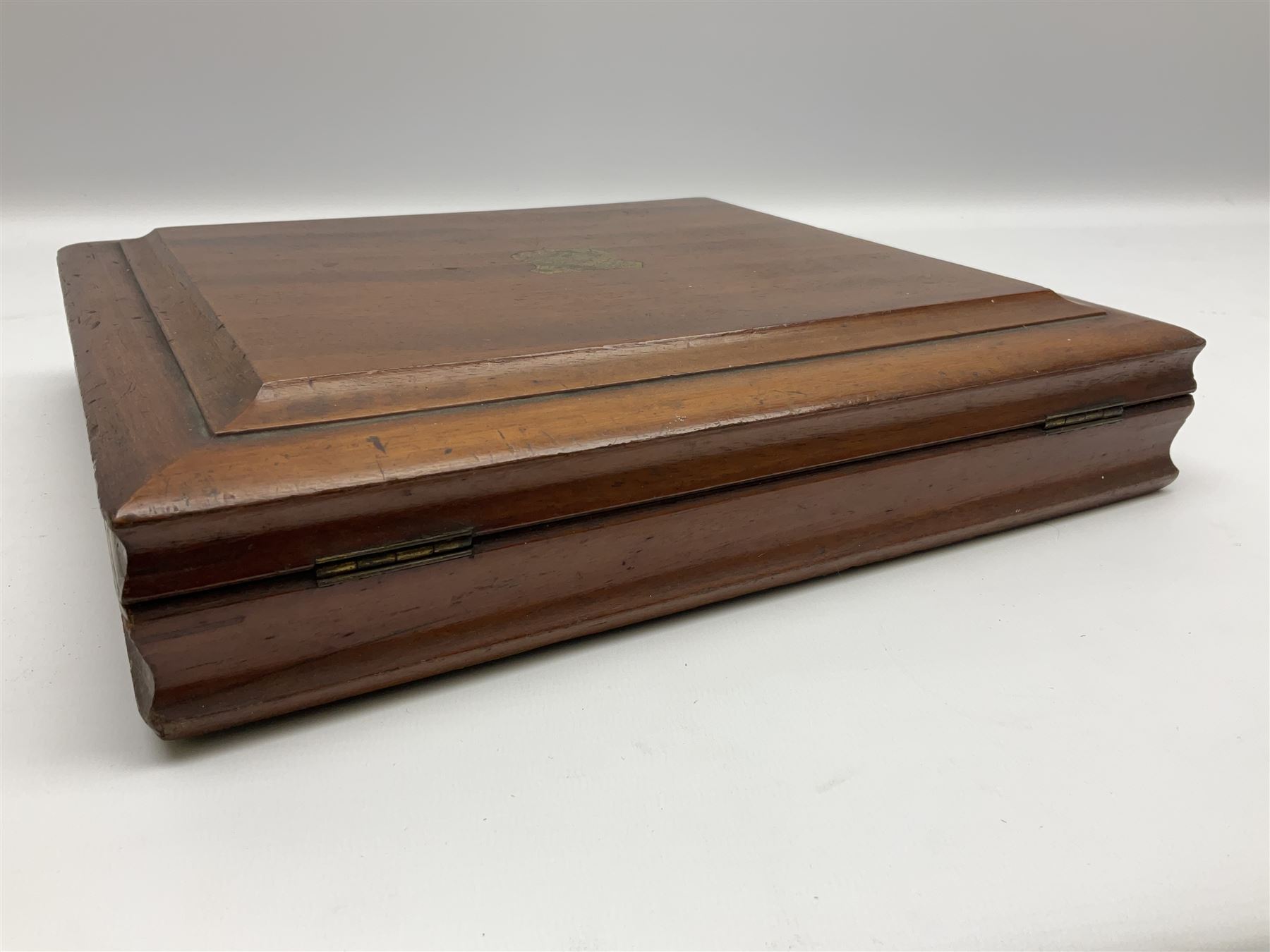 Victorian silver plated dessert set by Elkington & Co for twelve place settings, each reeded handle with vacant cartouche, each with Elkington & Co mark, date letter for 1861, and registration lozenge, contained within a mahogany case with vacant brass cartouche to the hinged cover, opening to reveal a Royal blue baize lined interior with removable tray, case H6cm W29.5cm D26.5cm