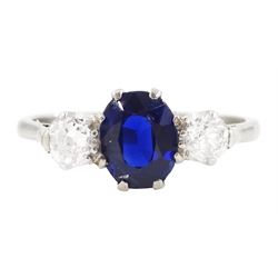 Early 20th century platinum three stone oval cut sapphire and old cut diamond ring, stampe...