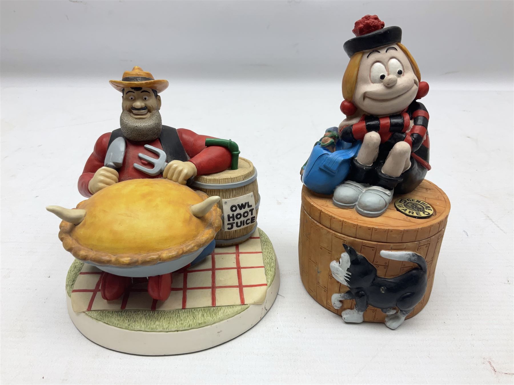 Eleven Robert Harrop figures from the Beano Dandy collection, comprising One Man & His Dawg BDS08, Picnic Desperate Dan BDS04, Fatty BD07, Desperate Dan BD03, Roger the Dodger BD20, Dennis the Menace BD01, Beryl the Peril BD05, Minnie the Minx BD04, Surfing BP03, two Spotty BD16, together with a Genuine Beano Ware lidded box (12)