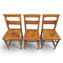 Country pine draw leaf table, bench seat and six chapel chairs, the top of plank construction, with two frieze drawers, additional leaves extending to 320cm, with bench seat and six elm chapel seats
