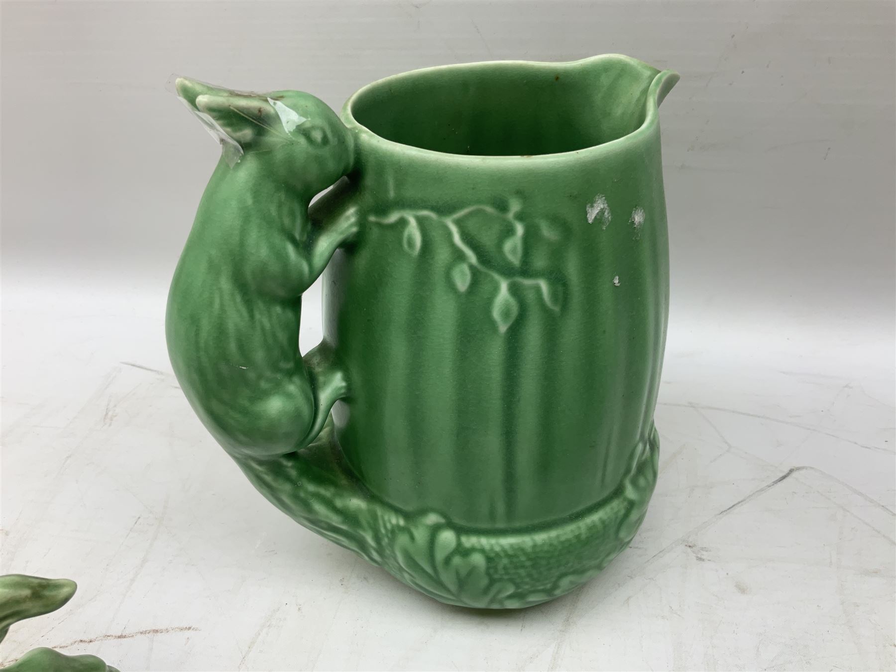 Sylvac blue rabbit no. 1067, green horse no. 1334, jug with squirrel handle no. 1958 (a/f), Royal Doulton dog figure, and other ceramics in one box