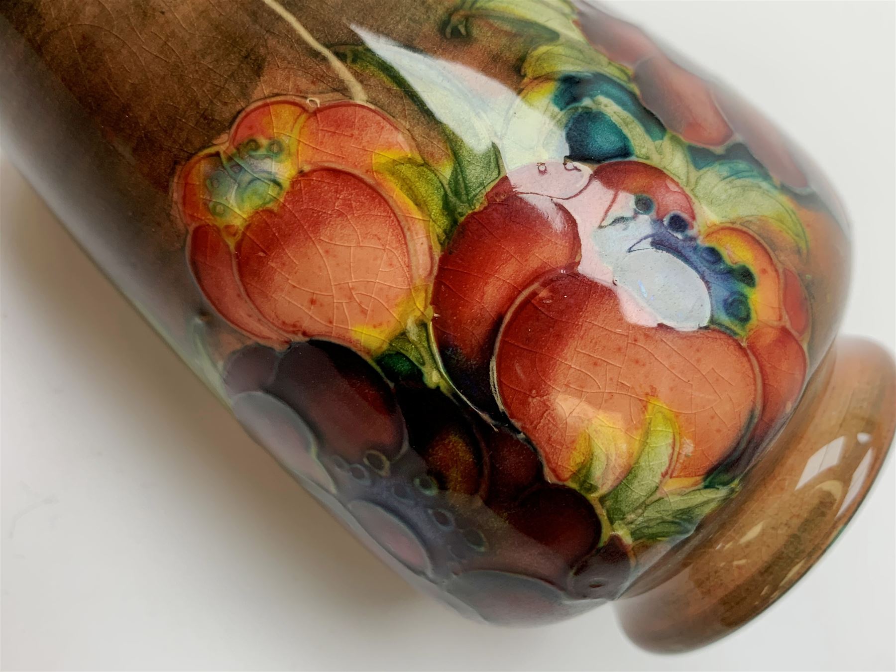 A Moorcroft flambe vase, decorated in the Anemone pattern, with impressed marks beneath, H10.5cm. 