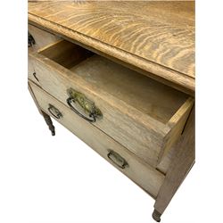 Early 20th century stripped oak chest dressing chest, fitted with two short and two long drawers, Art Nouveau handles, swing mirror back