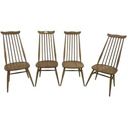 Ercol - set of four mid-20th century elm and beech Windsor 'Goldsmith' dining chairs, yoke cresting rail over high spindle back