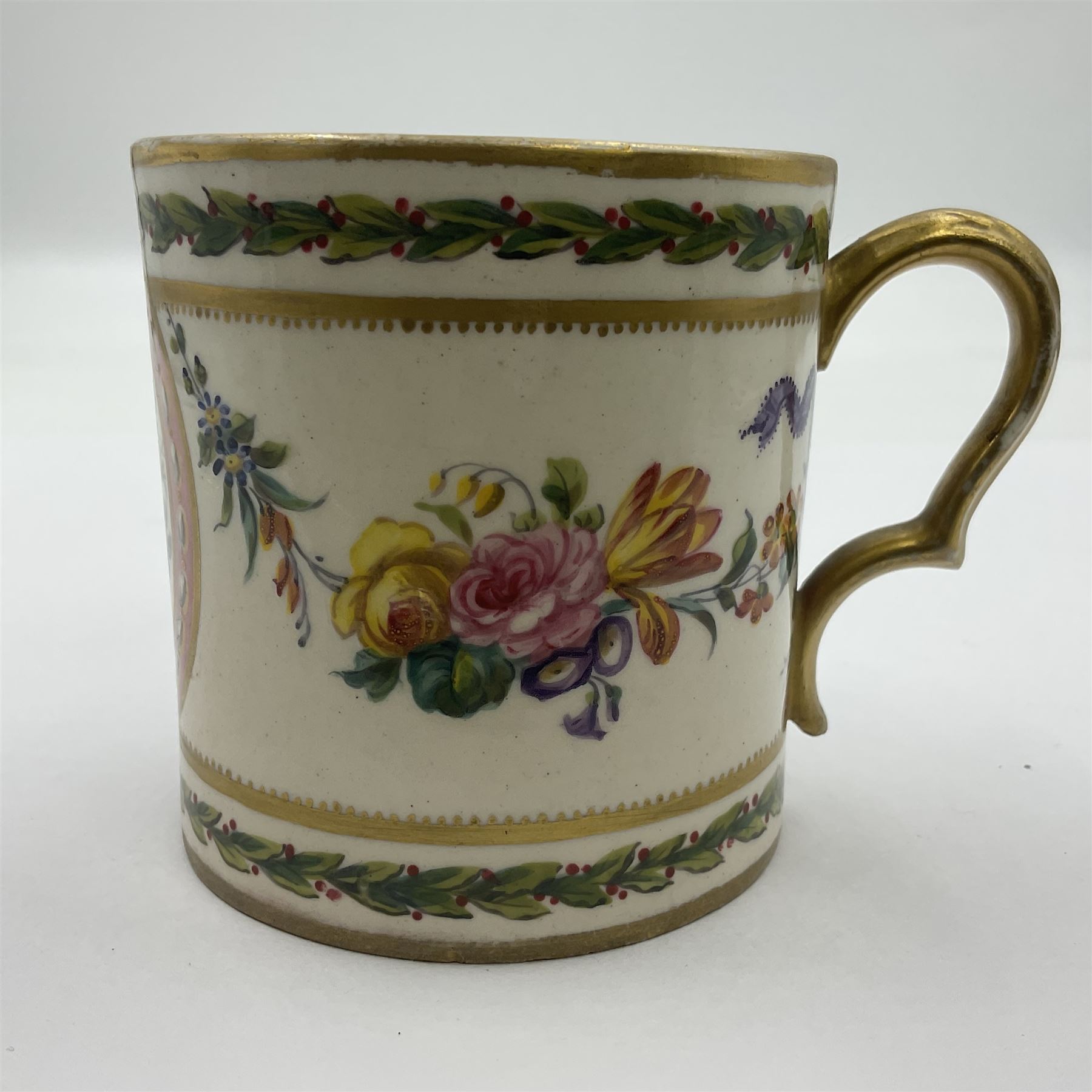 Sèvres soft paste porcelain coffee can and saucer with date code for 1780, painted with pink oval panels bordering bouquets of flowers, united by swags of flowers tied with purple ribbons, within laurel leaf borders, interlaced LL monogram enclosing date letters CC above painters marks for Nicquet, coffee can H7.5cm, saucer D15cm