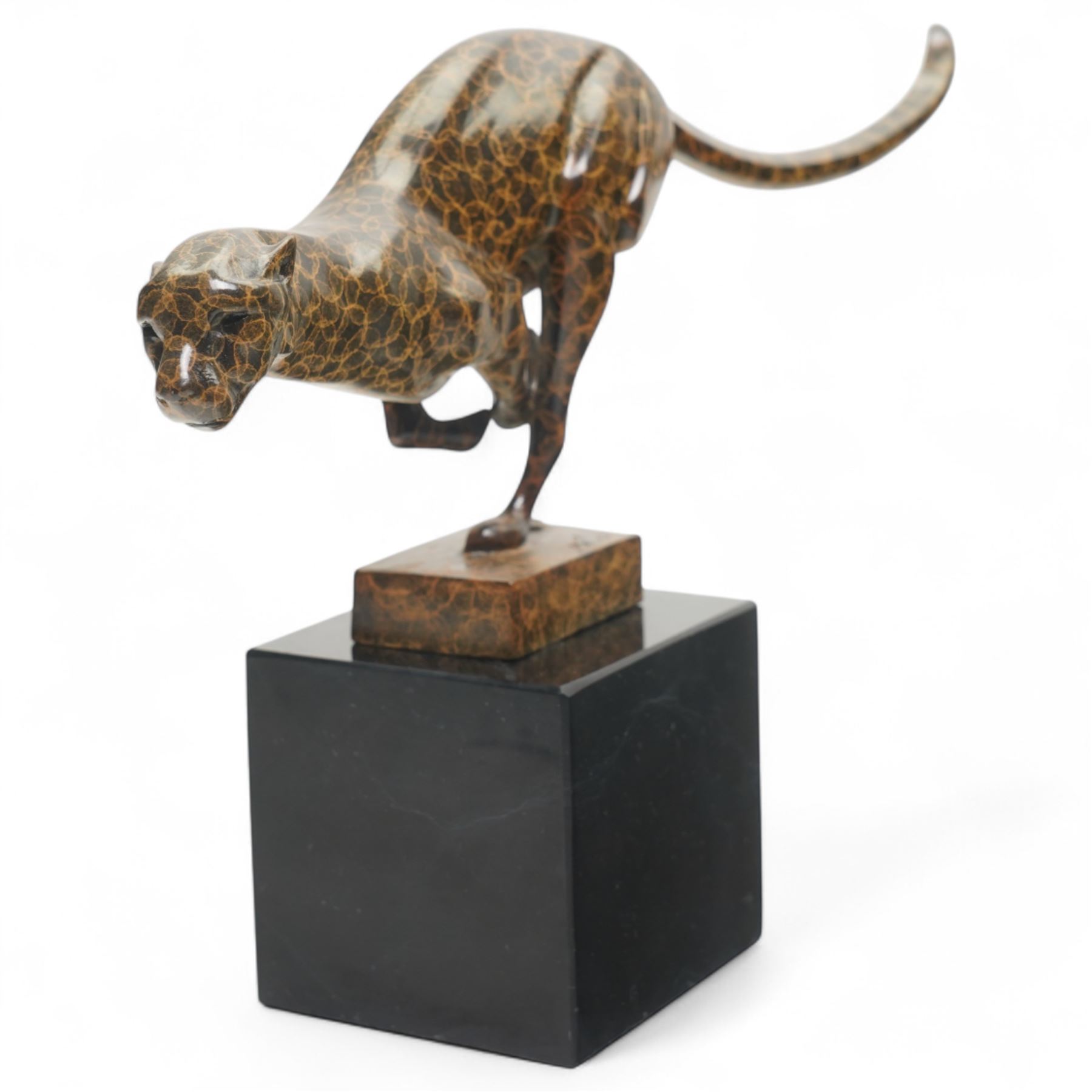 After Milo - Bronze two toned figure of running cheetah, upon a rectangular marble base, signed and with foundry mark, H20cm