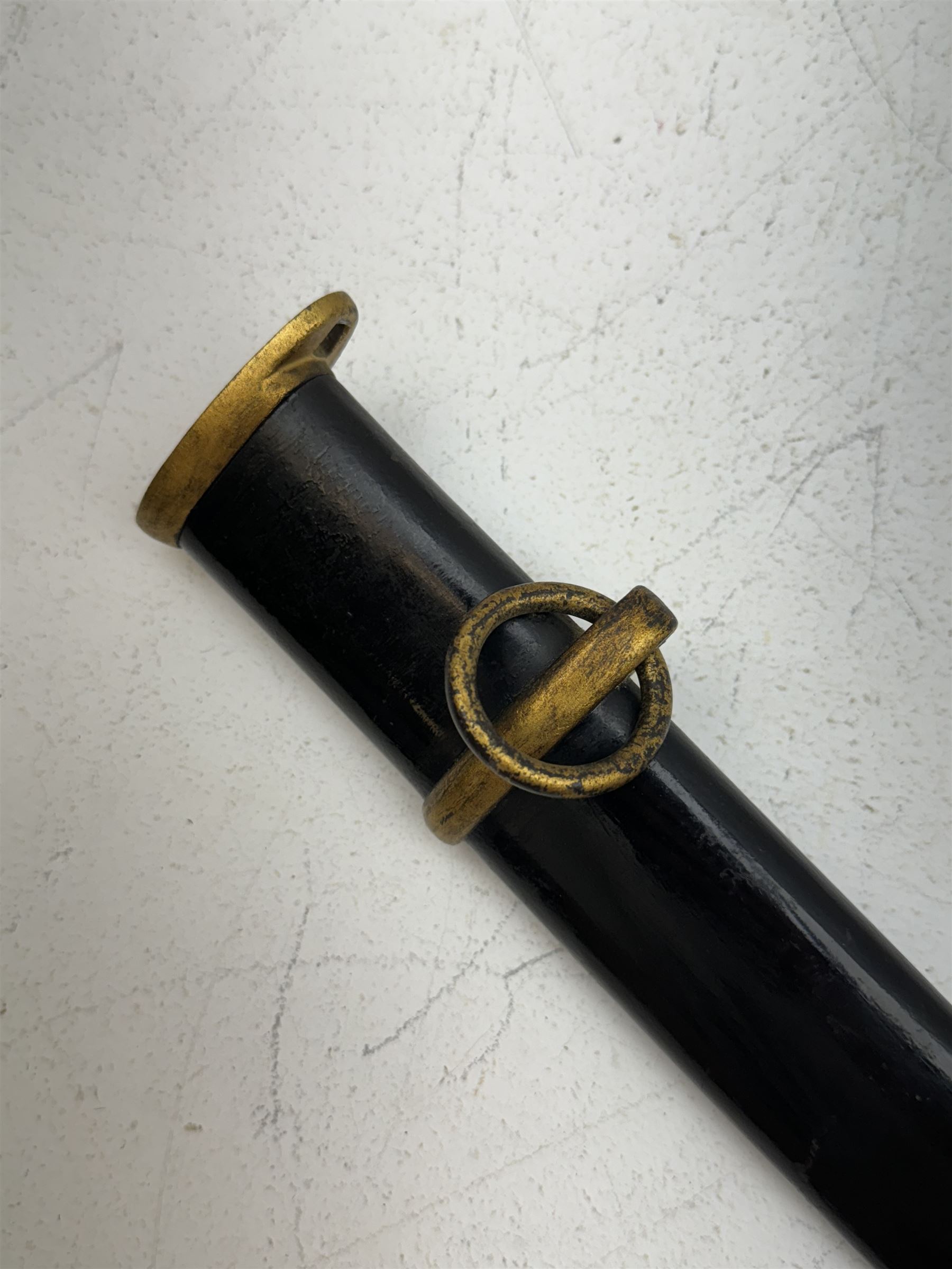 WWII Japanese katana with cast pierced tsuba, the L69cm arsenal steal blade marked 144559, with black lacquer Saya (scabbard), L97cm overall