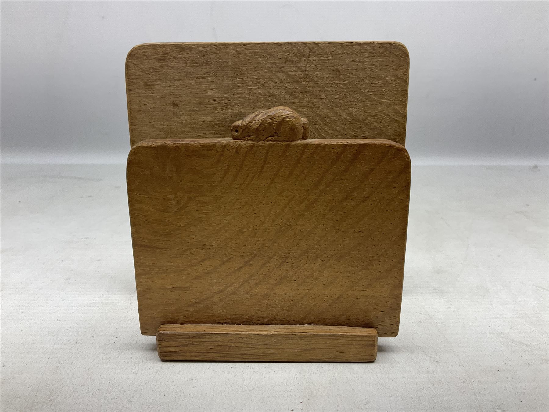 'Rabbitman' oak letter rack of two graduated square panels on a slab base, with carved with rabbit signature, by Peter Heap of Wetwang, H12cm
