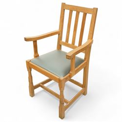 Beaverman - Six dining chairs, comprising four side chairs and two carvers, each with slatted backs, grey leather seats and square chamfered front supports, carved with signature beaver to the back stretcher, by Colin Almack of Sutton near Thirsk 