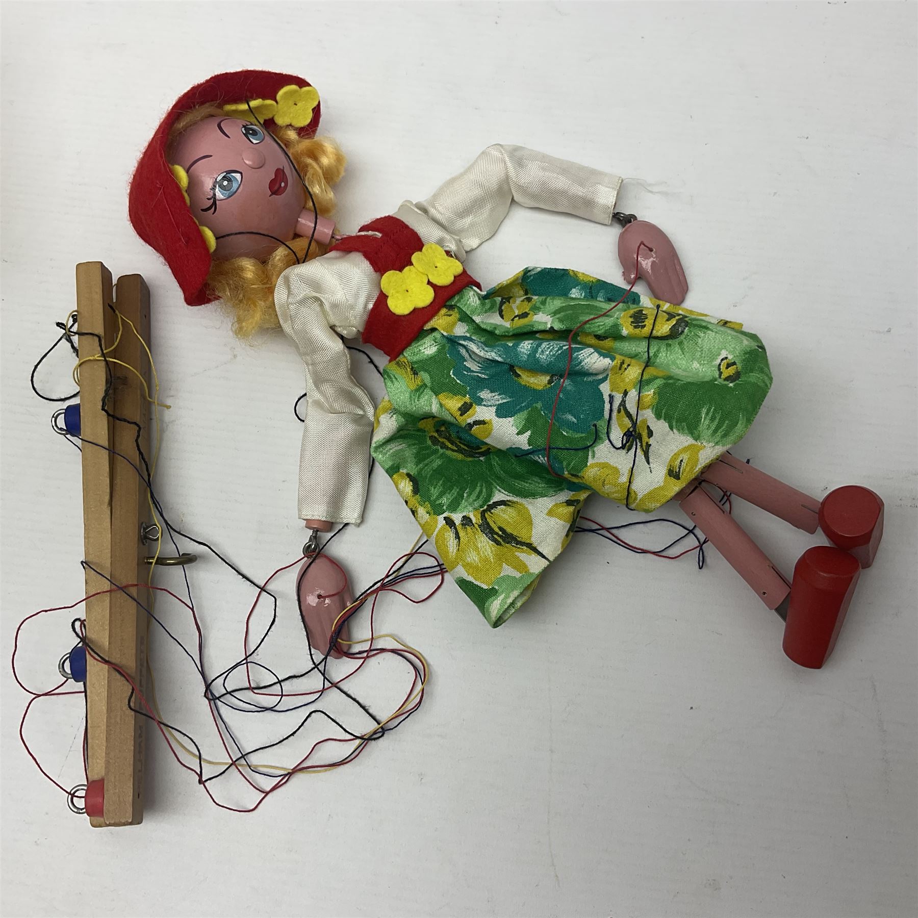 Pelham Puppet - Tyrolean Girl in yellow box; three 'A' Team action figures; clockwork plastic Mickey Mouse figure; and seven various fashion dolls (12)