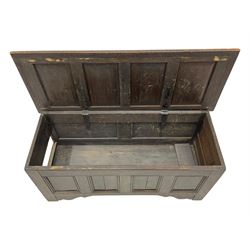18th century design oak coffer, four panel hinged lid over four panel front, panelled sides, on stile supports with shaped brackets 