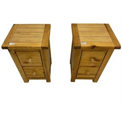 Pair of pine two drawer bedside lamp chests