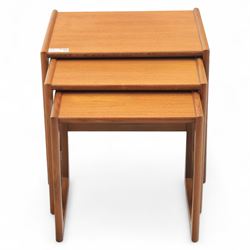 G-Plan - mid 20th century nest of three teak tables, rectangular tops with rounded edges, supported by sculptural open sided frames
