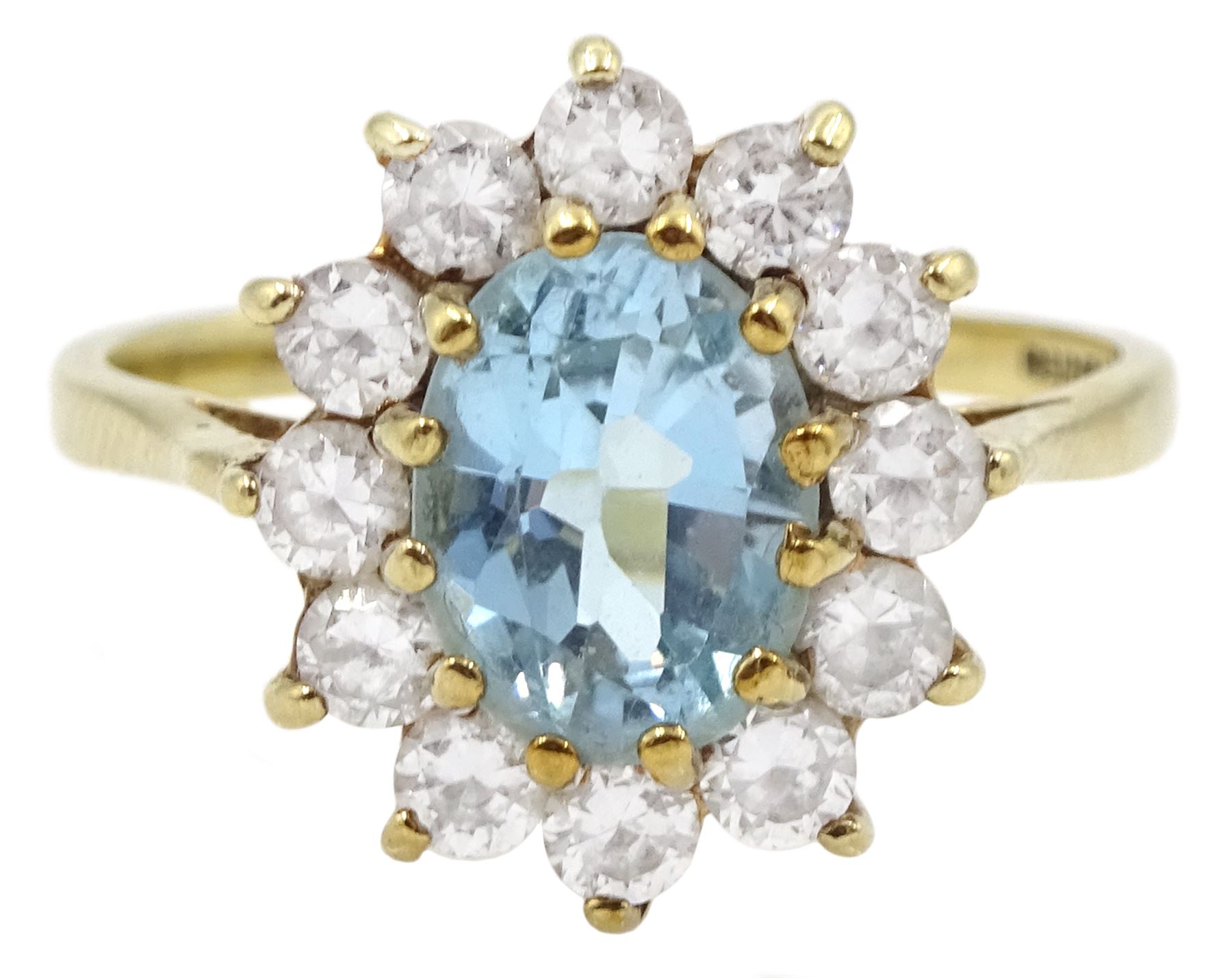 9ct gold oval blue topaz and cubic zirconia cluster ring, hallmarked 