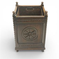 20th century carved fireside accessories; a carved coal bucket with metal liner and a carved fire screen
