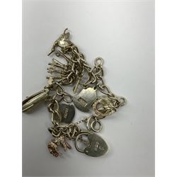 Two Klaus Kobec Entourage gentleman's and ladies, bicolour stainless steel quartz bracelet wristwatches, round white dials with Roman numerals and date apertures, both boxed, silver charm bracelet, silver jewellery and other costume jewellery