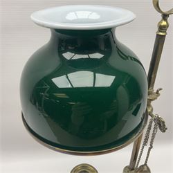 19th century brass Bouillotte candle lamp with adjustable green glass shade, with a circular base and snuffer, H48cm